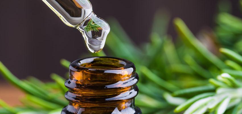Rosemary oil and oil dropper.Essential oil, aromatherapy, natural remedies.